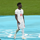 Bukayo Saka of England looks dejected after receiving his runners up medal following defeat in the UEFA Euro 2020 Championship Final between Italy and England at Wembley Stadium on July 11, 2021 in London, England.